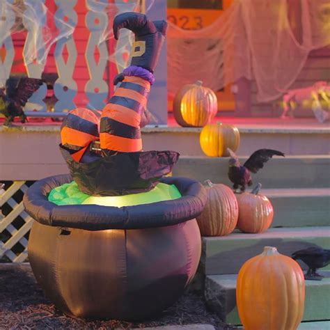 Elevate Your Halloween Décor with a Pumpkin and Witch Hot Inflatable
